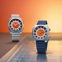 Die limitierte Taucheruhr kombiniert klassisches Design mit modernen Elementen wie Titangehäuse und knallorangem Zifferblatt.