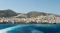Boat cruising in Greece, Island Syros, in the central Aegean, part of Cyclades group of Islands.