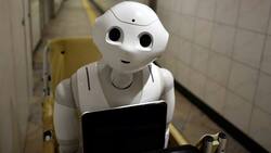 Roboter: Übernehmen immer mehr Routineaufgaben für Analysten. Keystone