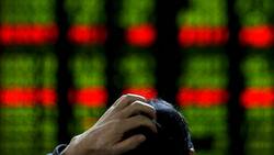 China: Aktien werden verstärkt als Pfand für Kredite eingesetzt. Keystone
