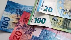 Euro- und Franken-Geldnoten.