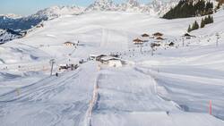 Skifahrer profitieren in Kitzbühel neu von einer Schneegarantie.