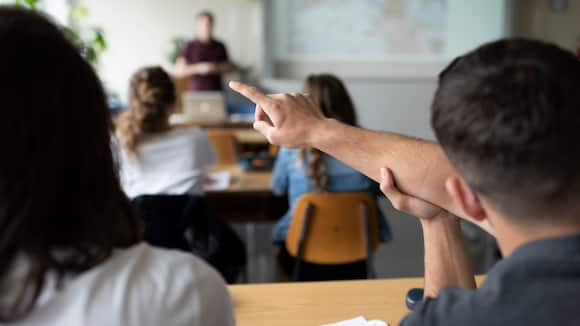 The third grade class W15d pictured during a geography lesson with teacher Tobias Stuedi (standing) at the gymnasium of the Cantonal School Solothurn, Switzerland, on May 15, 2018. The Cantonal School Solothurn consists of a gymnasium, a specialized upper secondary school (Fachmittelschule FMS) and a secondary school (Sekundarschule P), which prepares the pupils for the gymnasium. (KEYSTONE/Christian Beutler)