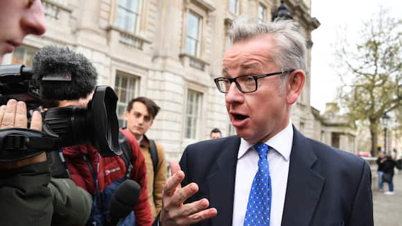 epa07494317 British Environment Secretary Michael Gove departs the Cabinet Office following cross party talks over a Brexit deal in central London, Britain, 09 April 2019. British Prime Minister Theresa May is in Paris and Berlin seeking an extension to article 50. EPA/ANDY RAIN