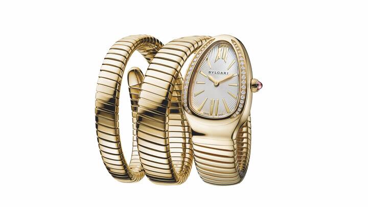 Die Serpenti Tubogas Uhr in Gold mit Diamanten.