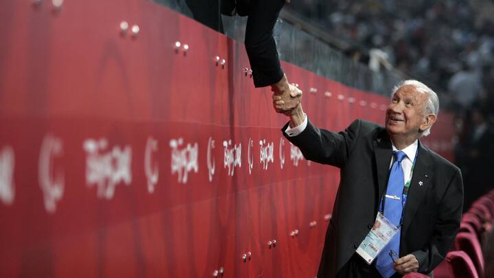IOC President Juan Antonio Samaranch, right,  attends the Paralympic Games opening ceremony in Beijing, China, Saturday, Sept. 6, 2008. (AP Photo/ Elizabeth Dalziel)