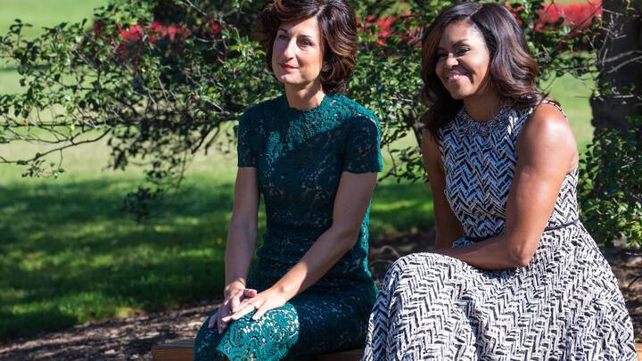 Next  to the White House Kitchen Garden on the South Lawn in Washington, DC, USA, on October 18, 2016., (l-r), Mrs. Agnese Landini, and First Lady Michelle Obama, enjoy a performance by students from a local Turnaround Arts school program, as part of the spousal program for the Italy Official Visit.White House Kitchen Garden on the South Lawn in Washington, DC, USA, on October 18, 2016.,   (Photo by Cheriss May/NurPhoto via Getty Images)