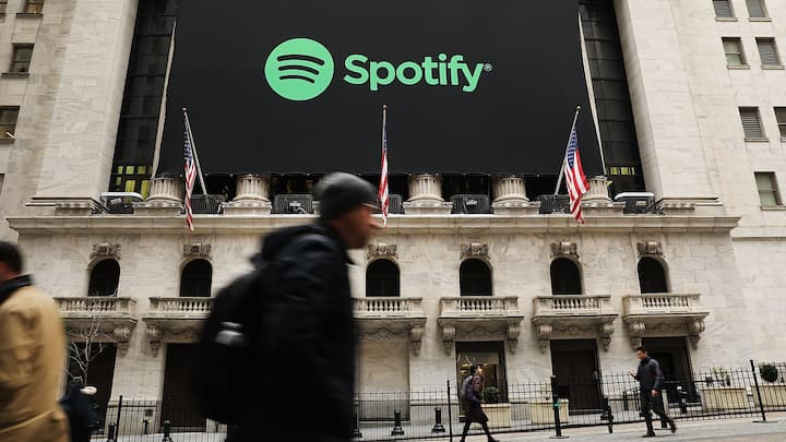 NEW YORK, NY - APRIL 03:  The Spotify banner hangs from the New York Stock Exchange (NYSE) on the morning that the music streaming service begins trading shares at the NYSE on April 3, 2018 in New York City.  Trading under the symbol SPOT, the Swedish company's losses grew to 1.235 billion euros ($1.507 billion) last year, its largest ever.  (Photo by Spencer Platt/Getty Images)