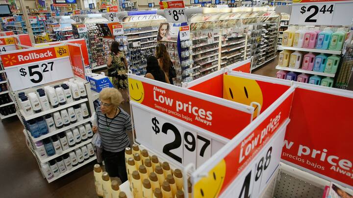 NORTH MIAMI, FL - AUGUST 14:  People shop at a Wal-Mart Store August 14, 2008 in North Miami, Florida. The company reported its second-quarter profit rose 17% and it raised its full-year forecast.  (Photo by Joe Raedle/Getty Images)