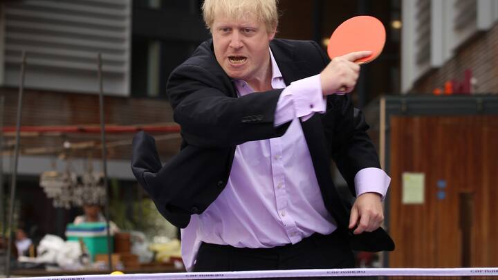 LONDON, ENGLAND - JUNE 25:  London Mayor Boris Johnson plays table tennis with school children at Bermondsey Square  on June 25, 2010 in London, England. The Mayor is promoting a summer initiative 'Playsport London: FreeSport' which is being launched to encourage Londoners to get active.  (Photo by Peter Macdiarmid/Getty Images)