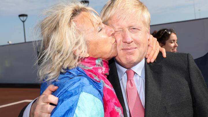 DOVER, ENGLAND - JULY 11: Boris Johnson is kissed by a member of the public during a visit to the Port of Dover Ltd., as part of his Conservative Party leadership campaign tour on July 11, 2019 in Dover, United Kingdom. Boris Johnson and Jeremy Hunt are the remaining candidates in contention for the Conservative Party Leadership and thus Prime Minister of the UK. Results will be announced on July 23rd 2019. (Photo by Chris Ratcliffe - Pool/Getty Images)