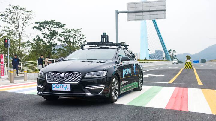 GUANGZHOU, CHINA - FEBRUARY 02:  Pony.ai self-driving cars run along a road during a trial run on February 2, 2018 in Guangzhou, China. Pony.ai, a year-old California-based self-driving car startup, will set up a fleet of self-driving cars to serve the public in Guangzhou.  (Photo by Liao Shupei/China News Service/VCG via Getty Images)