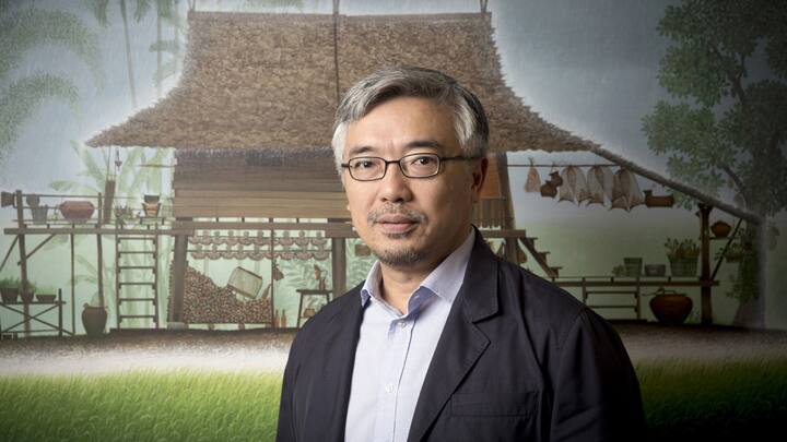 Tos Chirathivat, chairman of central Group, poses for a photograph after an interview in Bangkok, Thailand, on Wednesday, Jan. 3, 2018. *** SECOND SENTENCE HERE ***. Photographer: Brent Lewin/Bloomberg