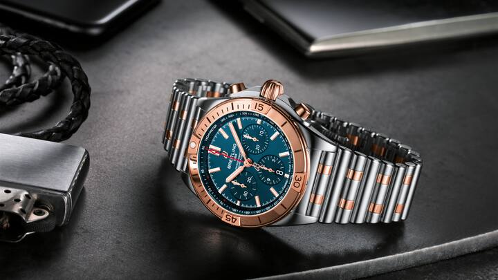 Two-tone Chronomat B01 42 with a blue dial and tone-on-tone chronograph counters highlighted by an 18 k red gold bezel, crown and pushers