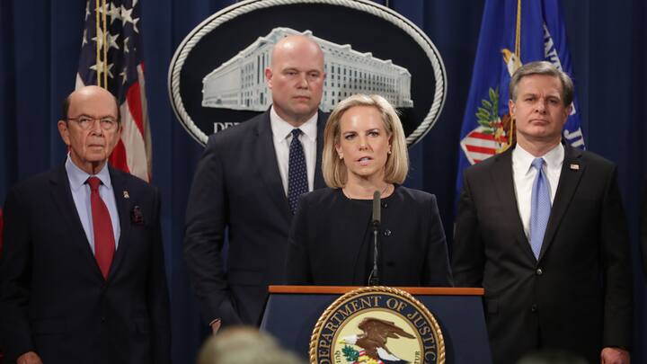 WASHINGTON, DC - JANUARY 28: (L-R) U.S. Commerce Secretary Wilbur Ross, acting Attorney General Matthew Whitaker, Homeland Security Secretary Kirstjen Nielsen and Federal Bureau of Investigation Director Christopher Wray announce new criminal charges against Chinese telecommunications giant Huawei at the Department of Justice January 28, 2019 in Washington, DC. The Justice Department is charging Huawei and its American affiliate with theft of trade secrets, wire fraud, and obstruction of justice.