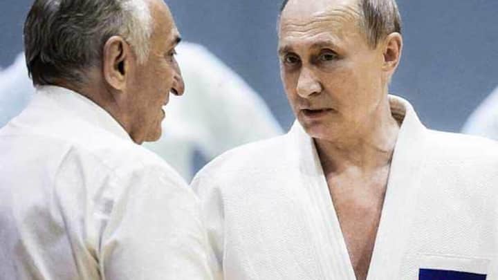 SOCHI, RUSSIA - FEBRUARY, 14 (RUSSIA OUT) Russian businessman and billionaire Vasily Anisimov (L) listens to President Vladimir Putin (R) during judo trainings at Yug Sport complex in Sochi, Russia, February,14,2019. Russian President Putin has arrived to Sochi to meet with Belarussian, Turkish and Iranian Presidents. (Photo by Mikhail Svetlov/Getty Images)