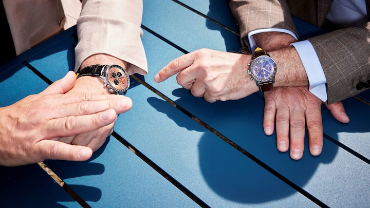 Präsident und CEO mit dem Breitling-Parademodell Navitimer.