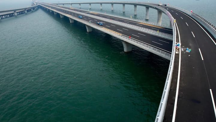completed-in-2011-chinas-jiaozhou-bay-bridge-is-the-worlds-longest-cross-sea-bridge-stretching-nearly-26-miles-almost-the-length-of-a-marathon-it-cut-travel-time-in-half-.jpg