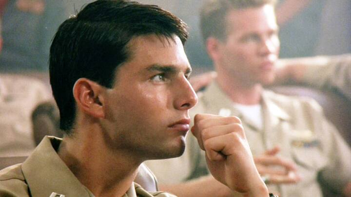 LOS ANGELES - MAY 16: The movie "Top Gun", directed by Tony Scott. Seen here in foreground, Tom Cruise as Lt. Pete "Maverick" Mitchell. In background, Val Kilmer as Lt. Tom 'Iceman' Kazansky. Initial theatrical release May 16, 1986. Screen capture. Paramount Pictures. (Photo by CBS via Getty Images)