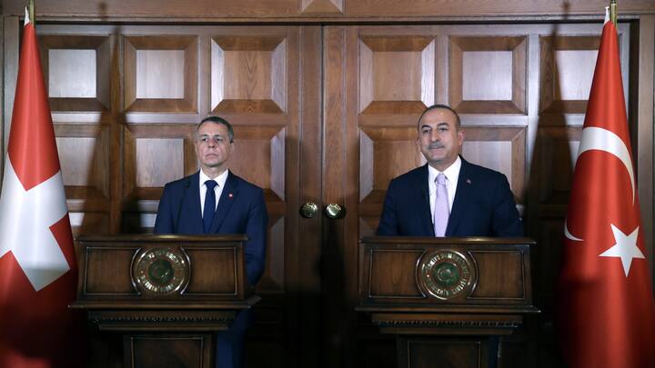 epa07711799 A handout photo made available by the Turkish Foreign Ministry press office shows Turkish Foreign Minister Mevlut Cavusoglu (R) and Swiss Foreign Minister Ignazio Cassis (L) speaking during a press conference after their meeting in Ankara, Turkey, 12 July 2019. EPA/CEM OZDEL HANDOUT HANDOUT EDITORIAL USE ONLY/NO SALES