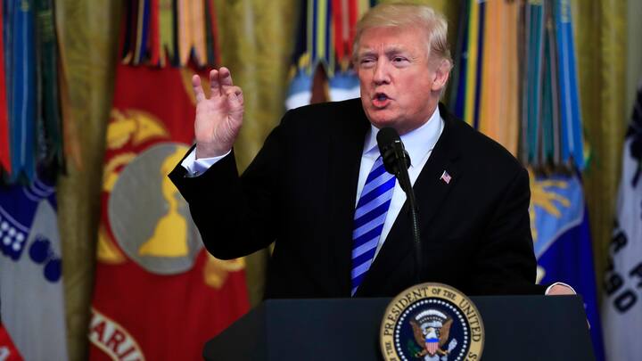 President Donald Trump speaks at a reception 