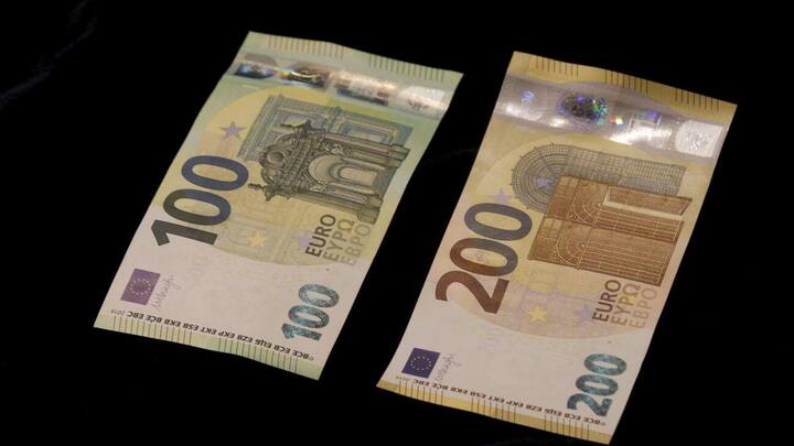 epa07596702 A view of new euro banknotes in Riga, Latvia, 24 May 2019. Latvia will be launching new 100 euro and 200 euro banknotes On 28th May 2019. These are the latest European series of banknotes with refurbished design and advanced security features. EPA/Toms Kalnins