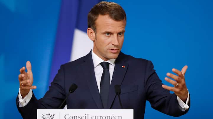 French President Emmanuel Macron speaks during a media conference at an EU summit in Brussels, Thursday, Oct. 18, 2018. EU leaders met for a second day on Thursday to discuss migration, cybersecurity and to try and move ahead on stalled Brexit talks. (AP Photo/Alastair Grant)
