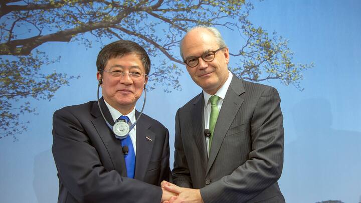 Ren Jianxin und Michel Demaré von Syngenta