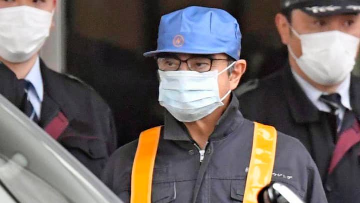 In this March 4, 2019, photo, former Nissan Chairman Carlos Ghosn, center with blue cap, leaves Tokyoâs Detention Center in Tokyo, Wednesday, March 6, 2019. Ghosn was released Wednesday after putting up 1 billion yen ( million) in bail. (Yu Nakajima/Kyodo News via AP, File)