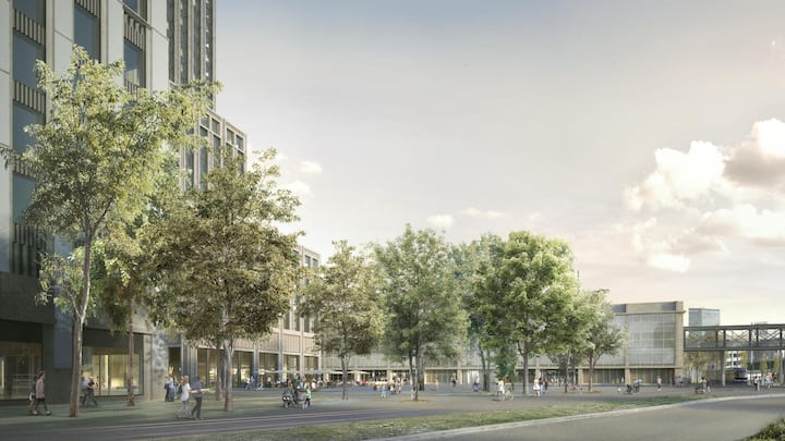 Es kombiniert das Stadion mit zwei 137 Meter hohen Hochhäusern mit 770 Mietwohnungen – 174 davon Genossenschaftswohnungen.