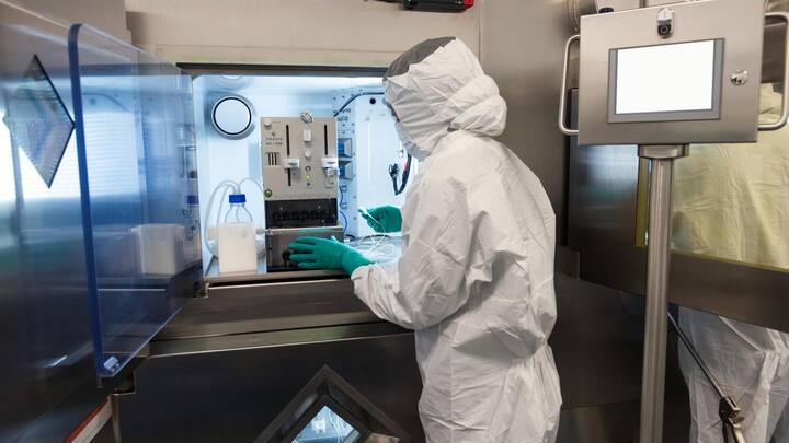 associate-in-full-personal-protective-equipment-using-specialized-equipment.jpg