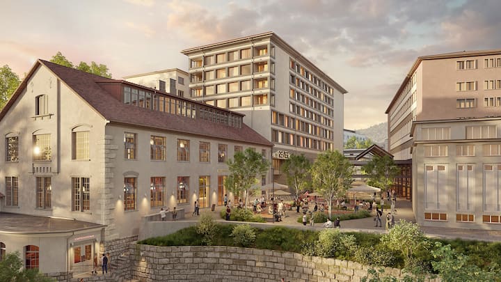 Der Industriebau im Vordergrund bleibt erhalten. Dahinter entsteht ein Nebau.