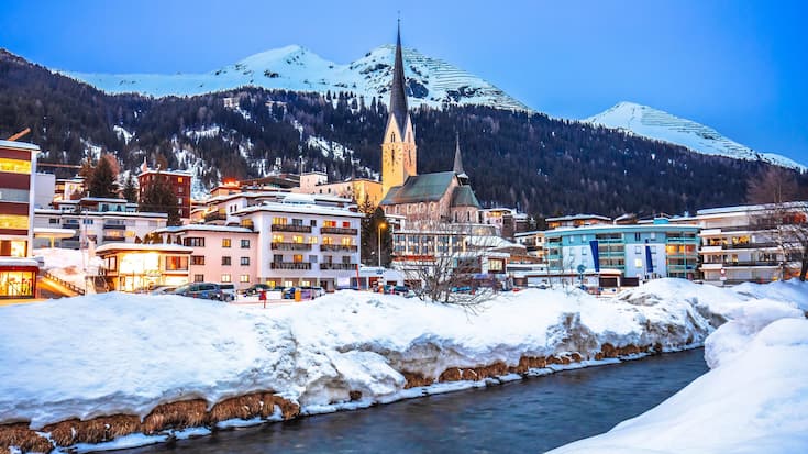 Idyllic mountain town of Davos in Swiss Alps evening view, luxury ski destination of Switzerland