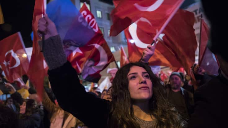 ISTANBUL, TURKEY - APRIL 01: People wave flags as they celebrate the unofficial results of local elections near AK Party's Istanbul Provincial Department in Istanbul, Turkey on April 01, 2019. (Photo by Arif Hudaverdi Yaman/Anadolu Agency/Getty Images)