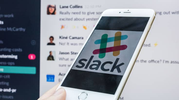 HONG KONG, HONG KONG - JANUARY 11:  In this photo illustration, a young man is using an iPhone as he uses Slack on January 11, 2018 in Hong Kong, Hong Kong. (Photo by S3studio/Getty Images)