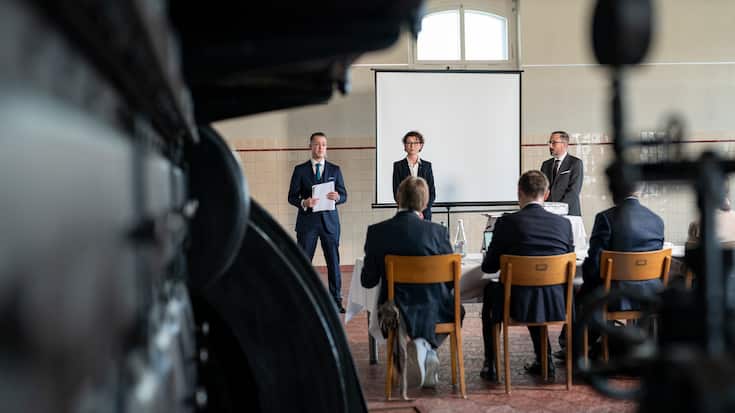 Cliff Kim, Andrea Steinmann Mascaro, Paul Hirschi (mit Bart). Raiffeisenbank Zuerich