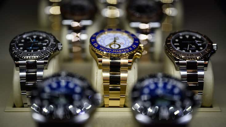LONDON, ENGLAND - MARCH 19: A Rolex Yacht Master II (C) is seen among other items on a dealers display at the London Watch Show on March 19, 2022 in London, England. Billed as London's largest ever watch show, the London Watch Show 2022 includes display stands for luxury watch dealers, manufacturers and watch-lover lifestyle products. The event runs March 18-20 at the Grosvenor House hotel on Park Lane, London. (Photo by Leon Neal/Getty Images)