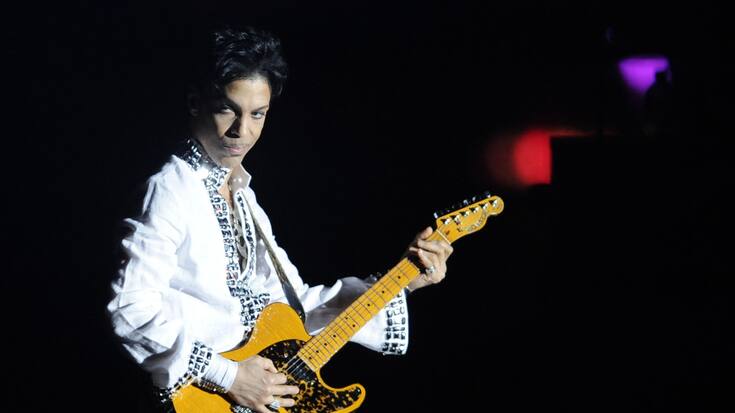 Prince performs during his headlining set on the second day of the Coachella Valley Music and Arts Festival in Indio, Calif., Saturday, April 26, 2008. (AP Photo/Chris Pizzello)