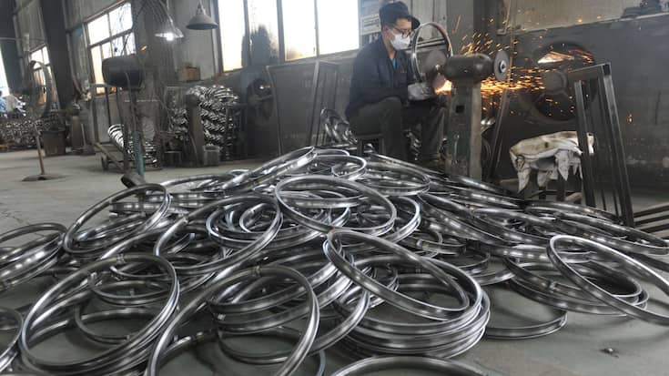 A worker labors in a factory of steel wheel rims in Hangzhou in east China's Zhejiang province Monday, June 04, 2018. The company said its export to the U.S. is one quarter lower due to the ongoing trade disputes.PHOTOGRAPH BY Feature China / Barcroft Images (Photo credit should read Feature China / Barcroft Images / Barcroft Media via Getty Images)