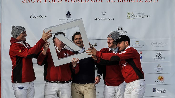 January 28th 2017, Engadin valley, St Moritz, Switzerland; Carsten Kahl of Deutsche Bank on the podium with Team Cartier as they celebrate the victory during Polo Game 4 at Snow Polo World Cup;  (Photo by Gaetano Piazzolla/Action Plus via Getty Images)