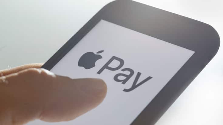 BERLIN, GERMANY - SEPTEMBER 28: The logo of the payment system Apple Pay is displayed on a smartphone on September 28, 2018 in Berlin, Germany. (Photo by Thomas Trutschel/Photothek via Getty Images)
