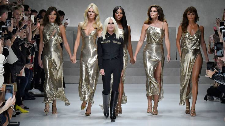 Carla Bruni, Claudia Schiffer, Donatella Versace, Naomi Campbell, Cindy Crawford and Helena Christensen walks the runway at the Versace Ready to Wear Spring/Summer 2018 fashion show during Milan Fashion Week Spring/Summer 2018 on September 22, 2017 in Milan, Italy. (Photo by Victor VIRGILE/Gamma-Rapho via Getty Images)