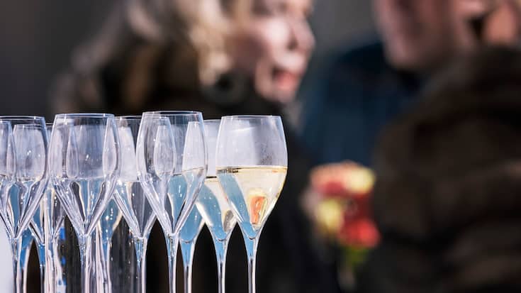 Empty and full glasses pictured at the White Turf horse race, which takes place every winter on the frozen Lake St. Moritz, in St. Moritz, Canton of Grisons, Switzerland, on February 19, 2017. (KEYSTONE/Christian Beutler)