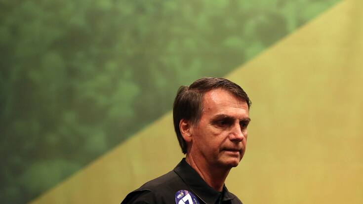 epa07086939 Jair Bolsonaro, presidential candidate of the Social Liberal Party (PSL) is seen during a campaign event in Rio de Janeiro, Brazil, 11 October 2018. Bolsonaro faces Haddad in the presidential elections run-off on 28 October.  EPA/Marcelo Sayao