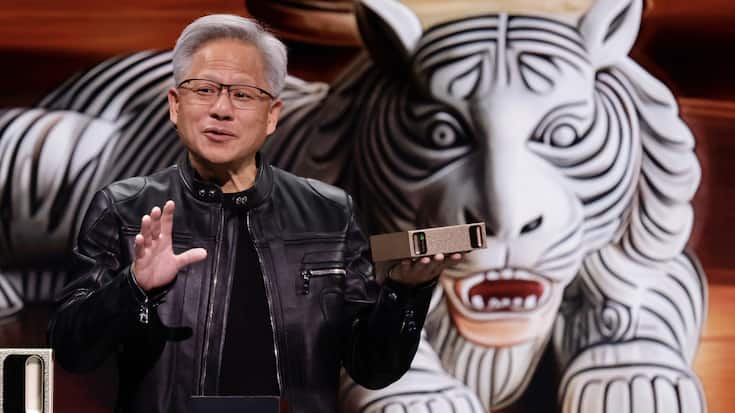 epa12115685 NVIDIA CEO Jensen Huang displays the 'GX Spark' as he speaks during his keynote speech as part of the COMPUTEX 2025 in Taipei, Taiwan, 19 May 2025. Jensan Huang officially announced NVIDIA's new products and the new company headquarters in Taiwan. EPA/RITCHIE B. TONGO