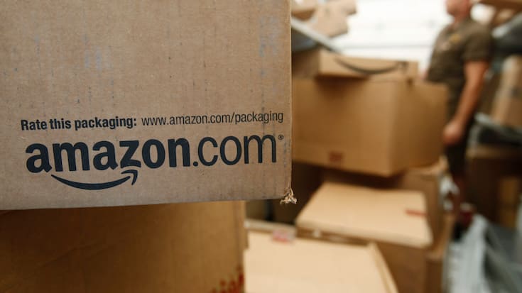 FILE - In this Oct. 18, 2010 file photo, an Amazon.com package awaits delivery from UPS in Palo Alto, Calif. Amazon on Thursday, March 13, 2014 said it is raising the price of its popular Prime membership to $99 per year, an increase of $20. It's the first price increase since the online retailer introduced its Prime membership program in 2005. T(AP Photo/Paul Sakuma, File)