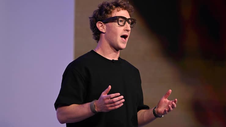 Meta CEO Mark Zuckerberg wears artificial intelligence-powered smart glasses and a wristband as he speaks during the company's Connect developer conference Wednesday, Sept. 17, 2025, in Menlo Park, Calif. (AP Photo/Nic Coury)