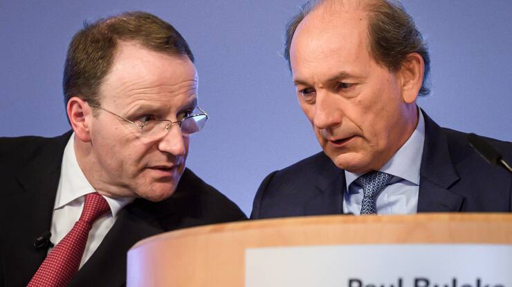 Swiss food giant Nestle CEO Ulf Mark Schneider (L) speaks to chairman Paul Bulcke prior to the annual general shareholders meeting on April 11, 2019 in Lausanne. (Photo by Fabrice COFFRINI / AFP)