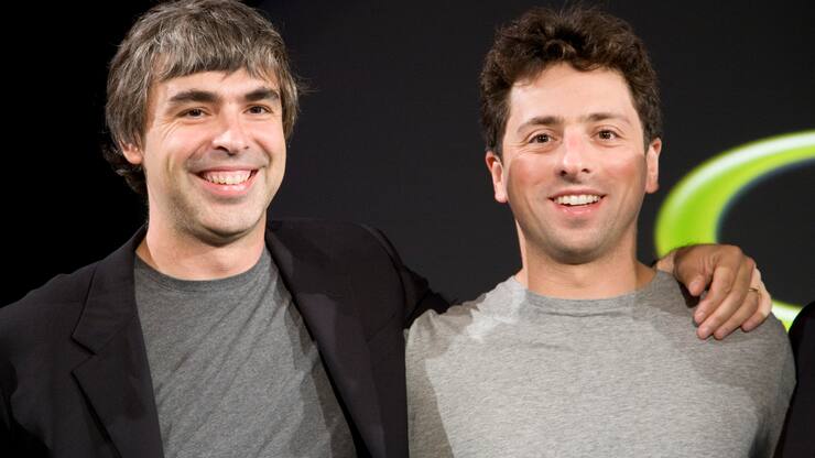 Larry Page (L) and Sergey Brin (R), the co-founders of Google, at a press event where Google and T-Mobile announced the first Android powered cellphone, the T-Mobile G1. (Photo by James Leynse/Corbis via Getty Images)