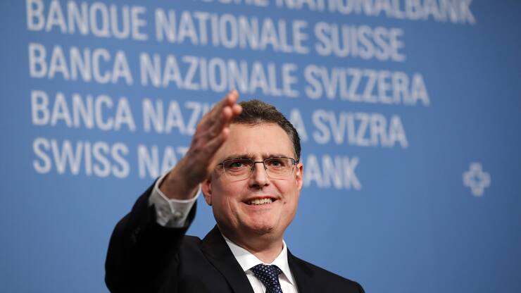 Thomas Jordan, president of the Swiss National Bank (SNB), gestures during the bank's rate announcement news conference in Bern, Switzerland, on Thursday, Dec. 13, 2018. TheÊSwiss National BankÊcut its inflation forecast and showed no inclination of moving off its crisis-era settings, citing the francs strength and mounting global risks. Photographer: Stefan Wermuth/Bloomberg via Getty Images